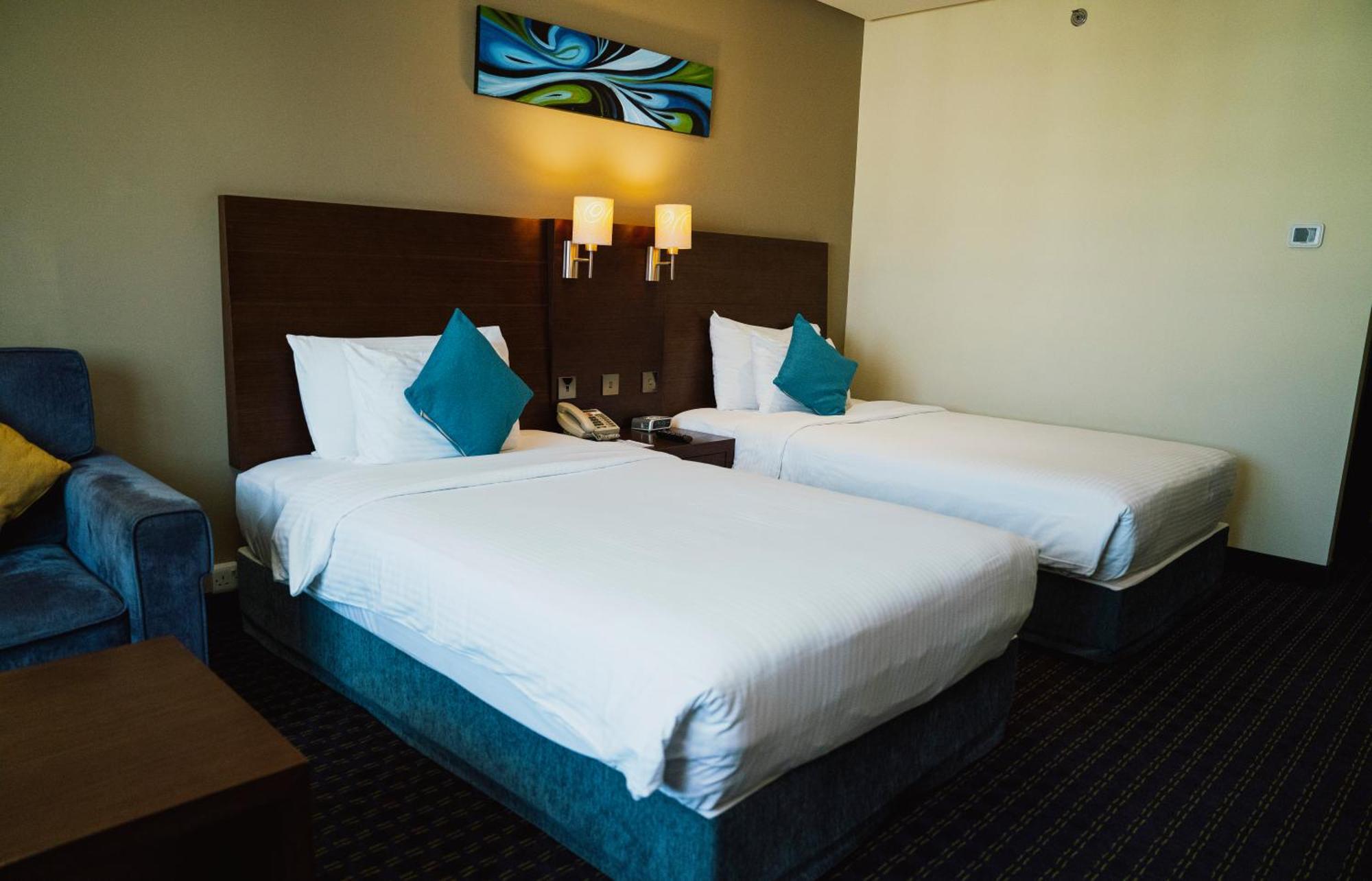 Hotell Western Premier Muscat